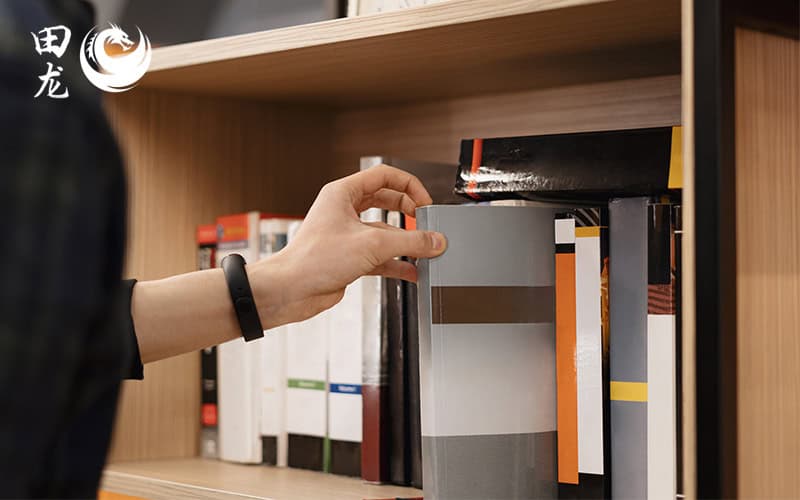 Choosing a book from the shelf